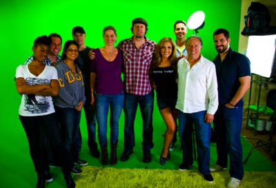 Malibu film crew posing in green screen studio